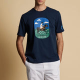 Navy blue t-shirt with a chest graphic of a polo player on a horse and "LA MARTINA POLO CLUB" text. Light blue "C" on right s