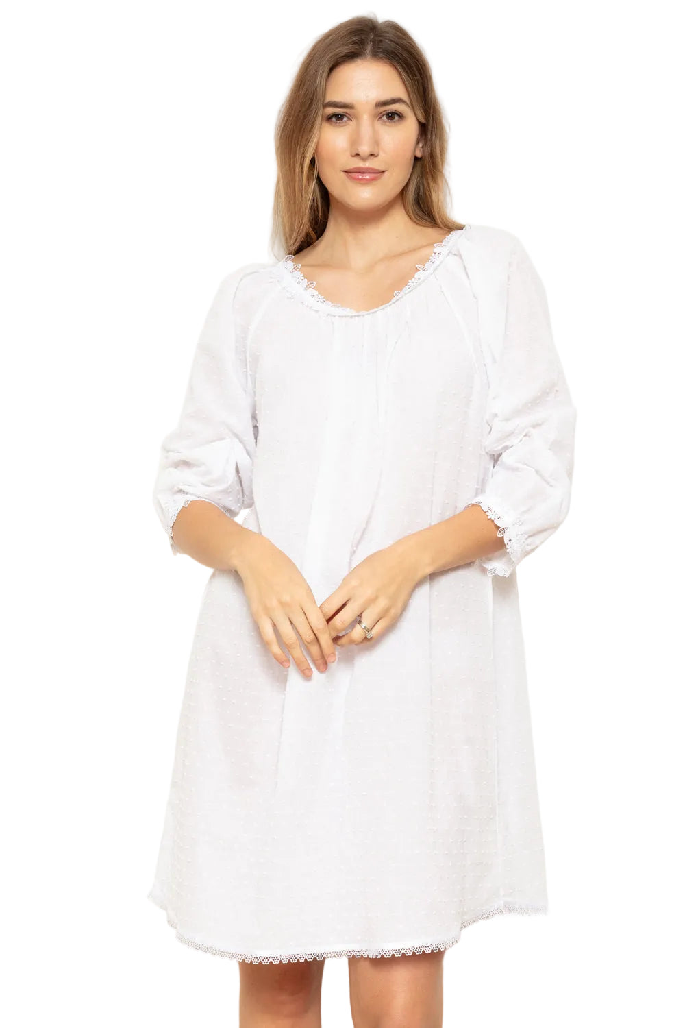 White SuperVoile Swiss dot short dress with gathered round neckline, puffed three-quarter sleeves, and lace trim.