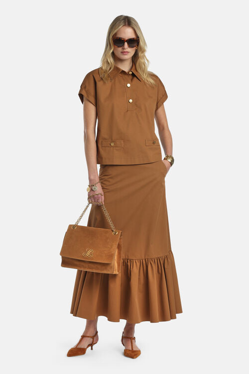 Tobacco brown short-sleeved collared shirt with a partial placket, three gold-toned buttons, and two front flap pockets, one