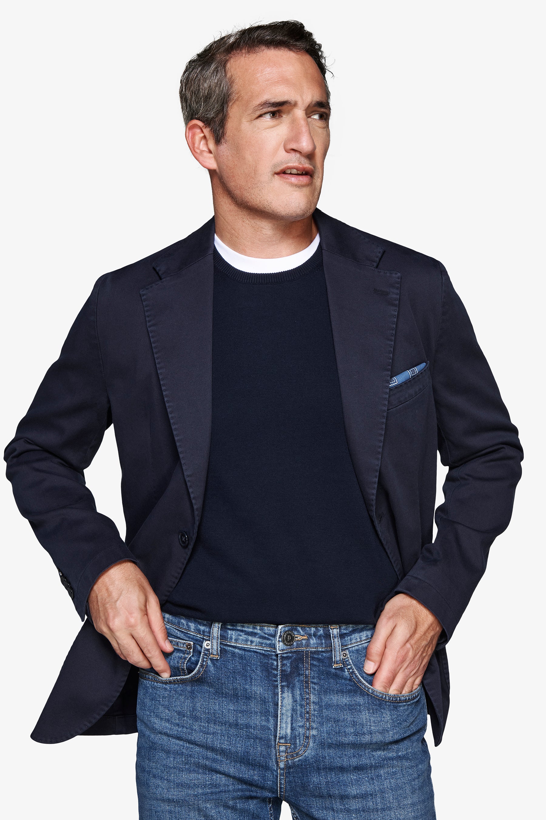 Navy blue single-breasted men's blazer with notched lapels, two-button closure, and flap pockets.