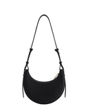 Black textured faux leather crescent crossbody bag with a thin adjustable strap and gold-toned zipper.