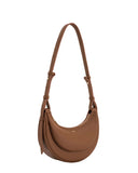 Brown textured crescent crossbody bag with an adjustable strap, gold-toned hardware, a top zipper, and a layered front design