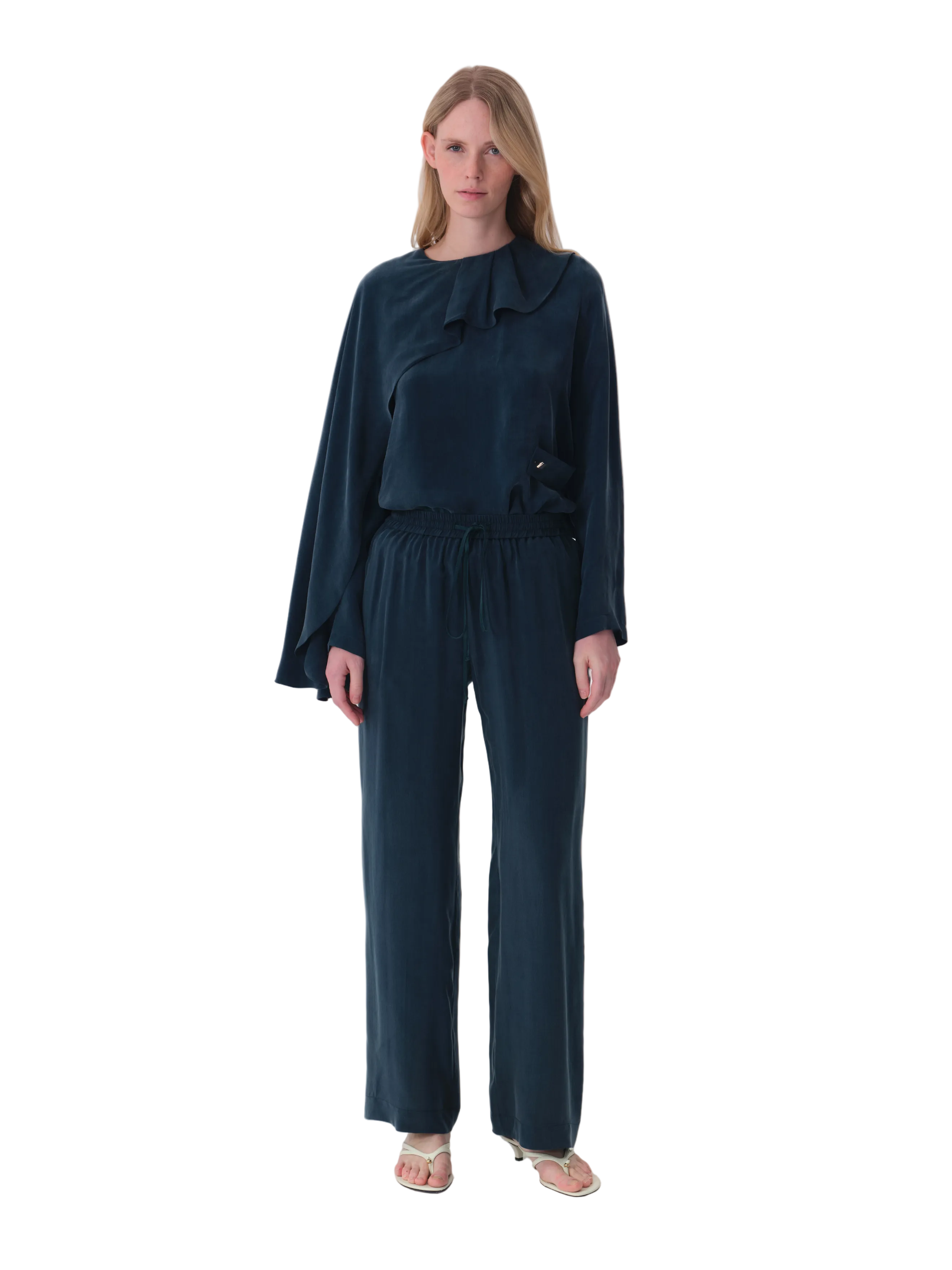 Petroleum blue wide-leg trousers with an elasticated drawstring waist, made from a soft, flowing fabric.