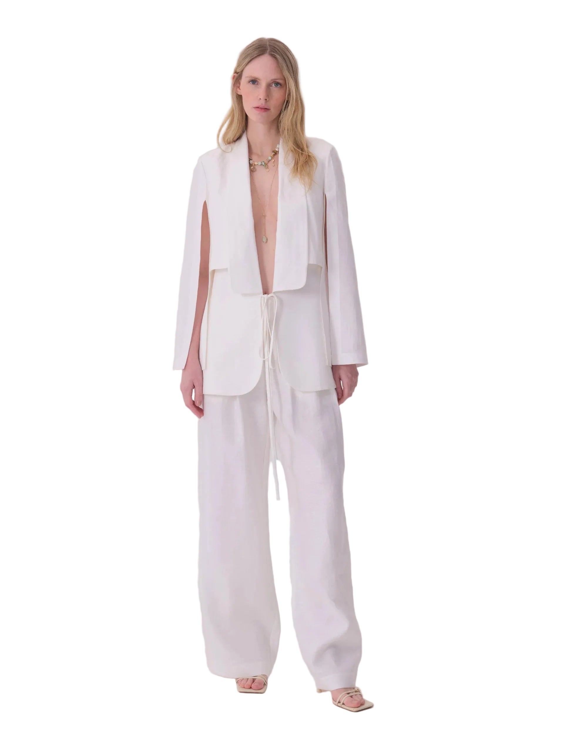 White split-sleeve cape jacket with wide notched lapels and a self-fabric tie closure at the waist.