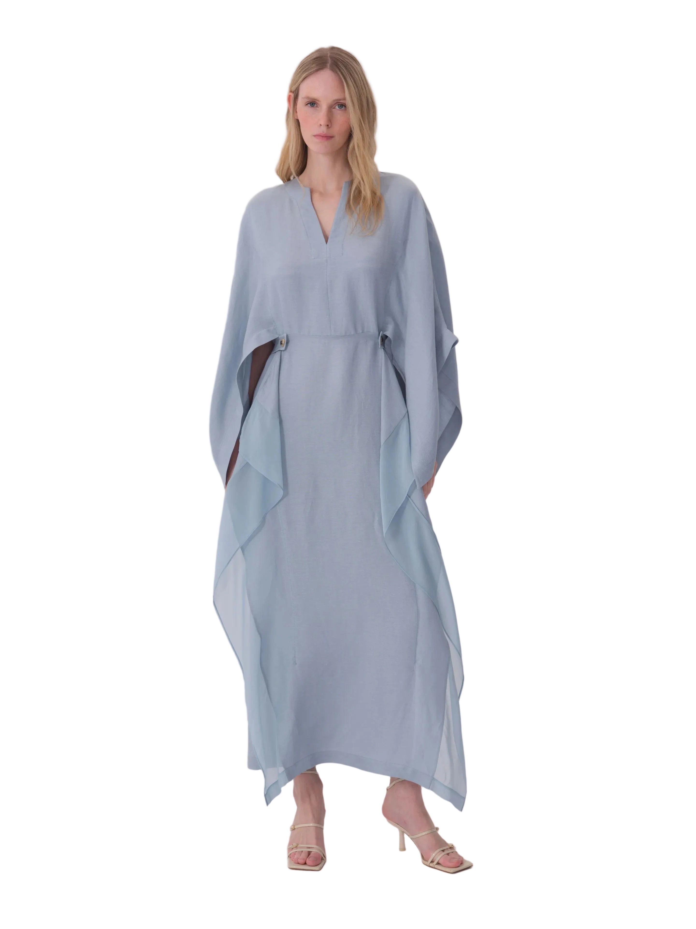 Light blue dress with a V-neck, wide sleeves, cinched waist detail, and flowing sheer overlay panels.