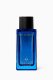Thameen Sapphire Baby Fragrance in a rectangular blue glass bottle with a black ribbed cap and gold-toned lettering.