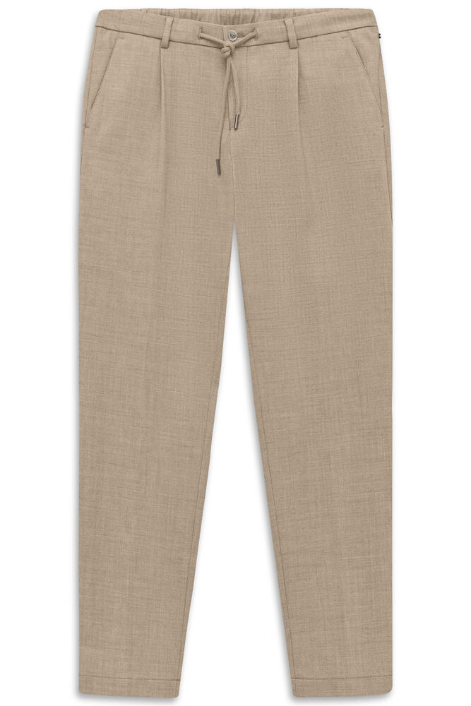 Beige woven tapered trousers with elasticated drawstring waist, belt loops, front pleats, and side slash pockets.