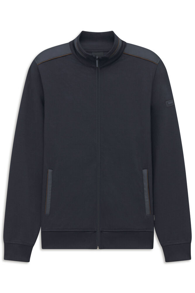 Dark grey men's full-zip stand collar jacket with ribbed cuffs and hem, contrast shoulder panels, and front welt pockets.