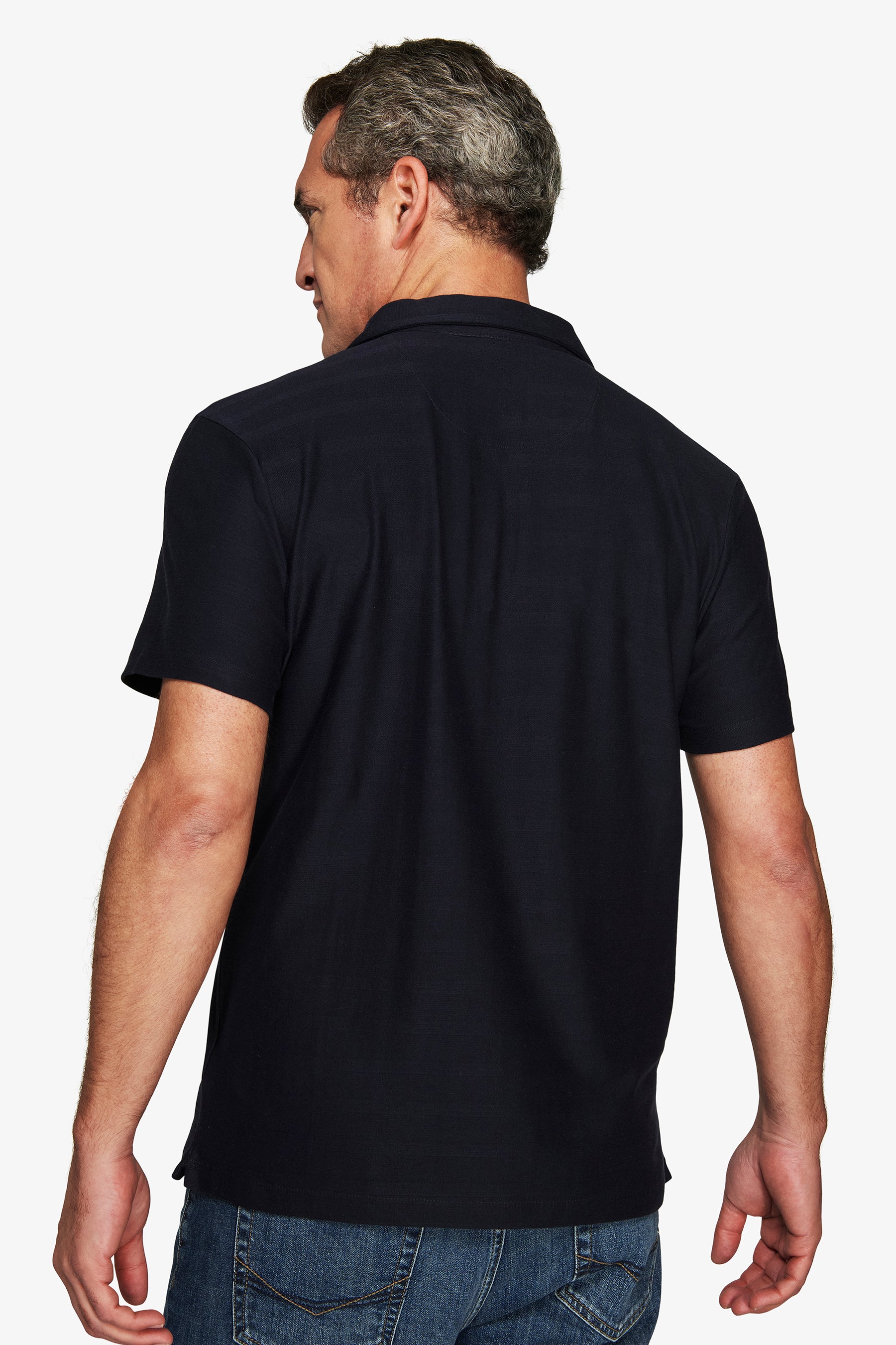 Dark blue short-sleeved knit polo shirt with a collar and a straight hem with small side vents.