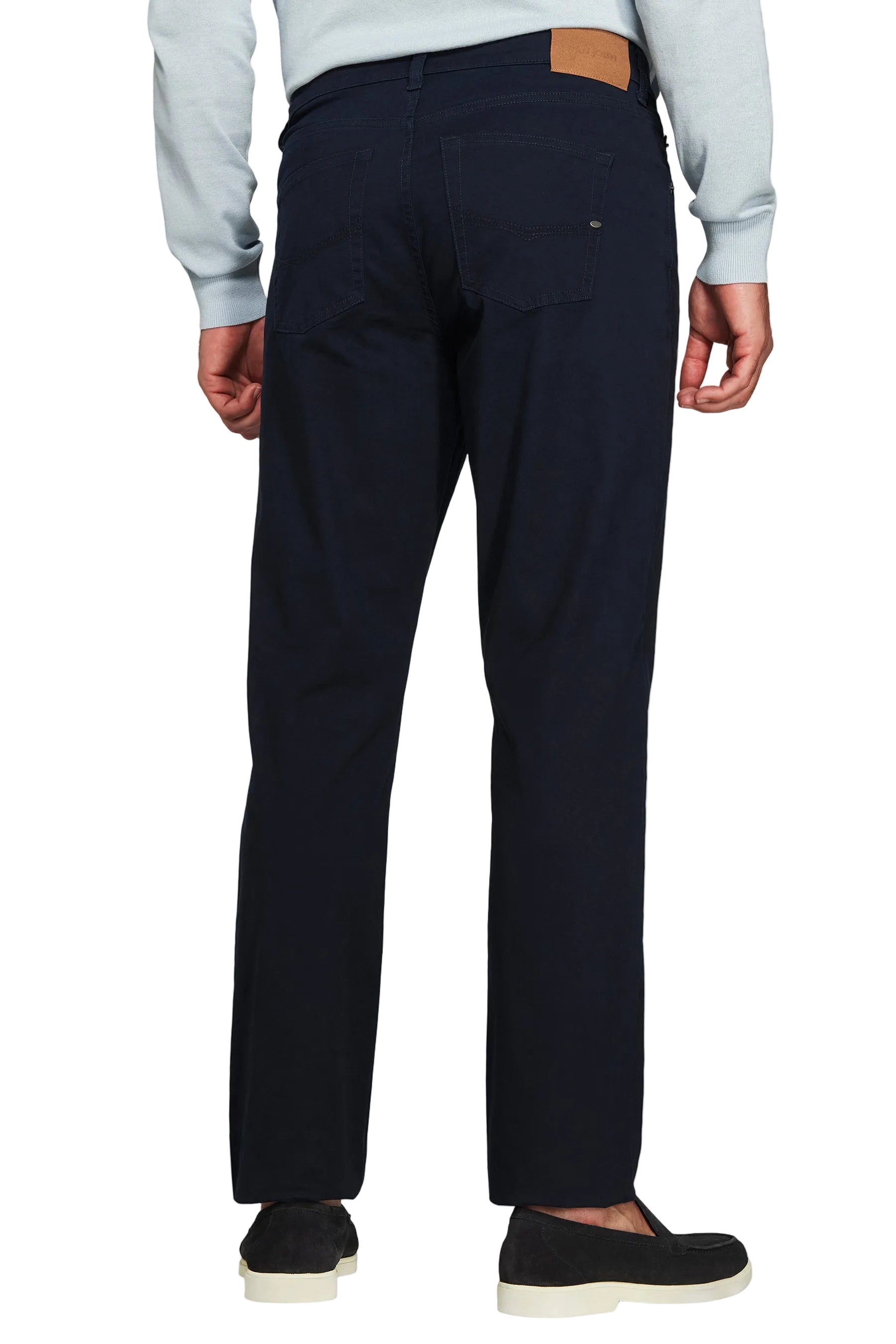Navy straight-leg trousers with two back pockets, a brown brand patch on the waistband, and a silver-toned rivet on the right