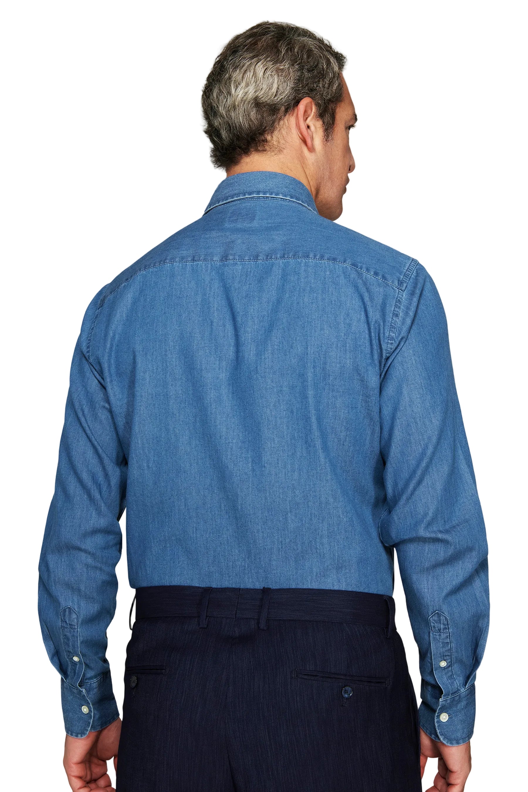 Azzurro blue denim long-sleeved shirt, seen from the back, with a shoulder yoke and white buttoned cuffs.