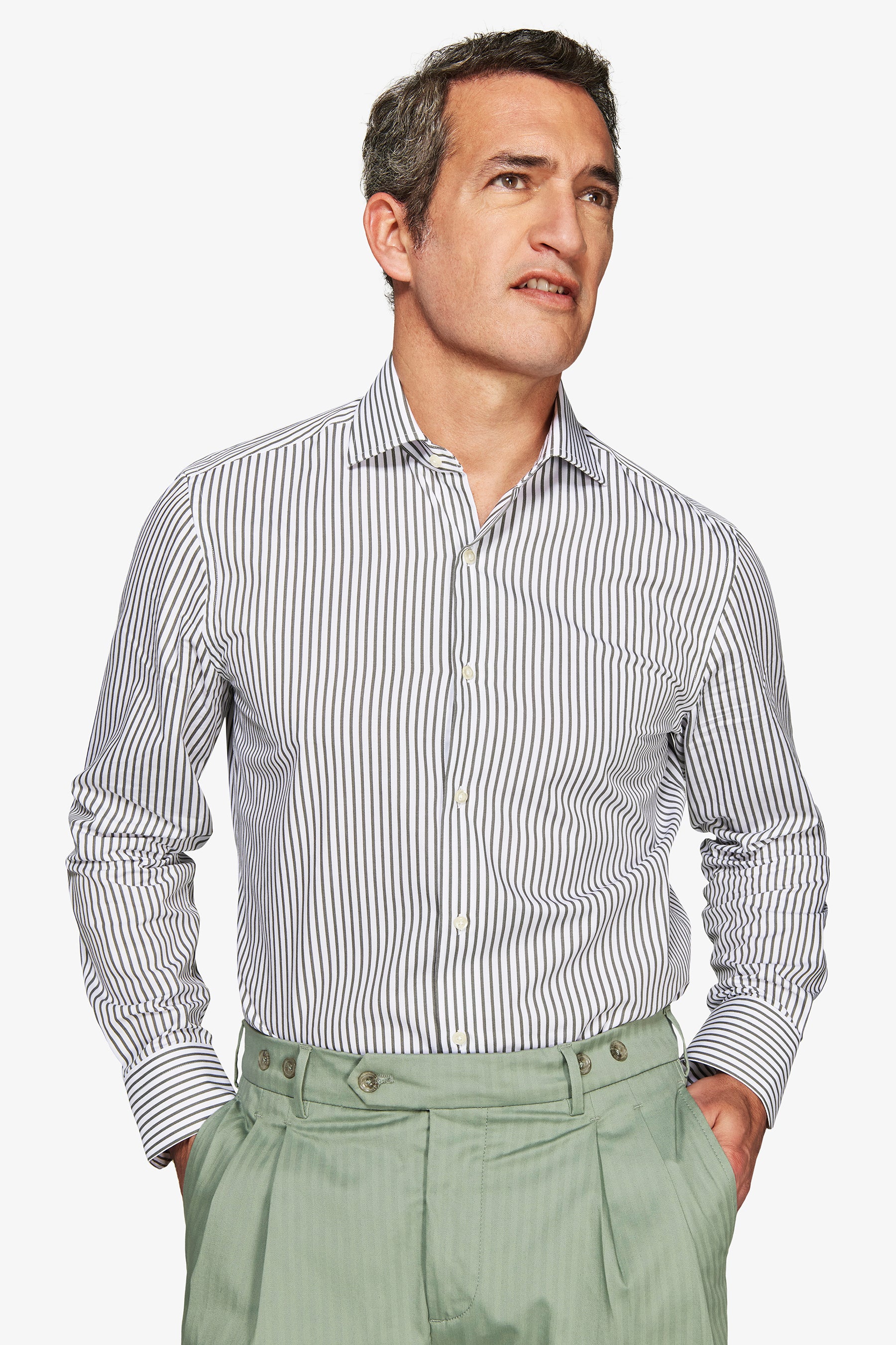 White long-sleeve button-up shirt with dark green vertical stripes, spread collar, and light buttons.