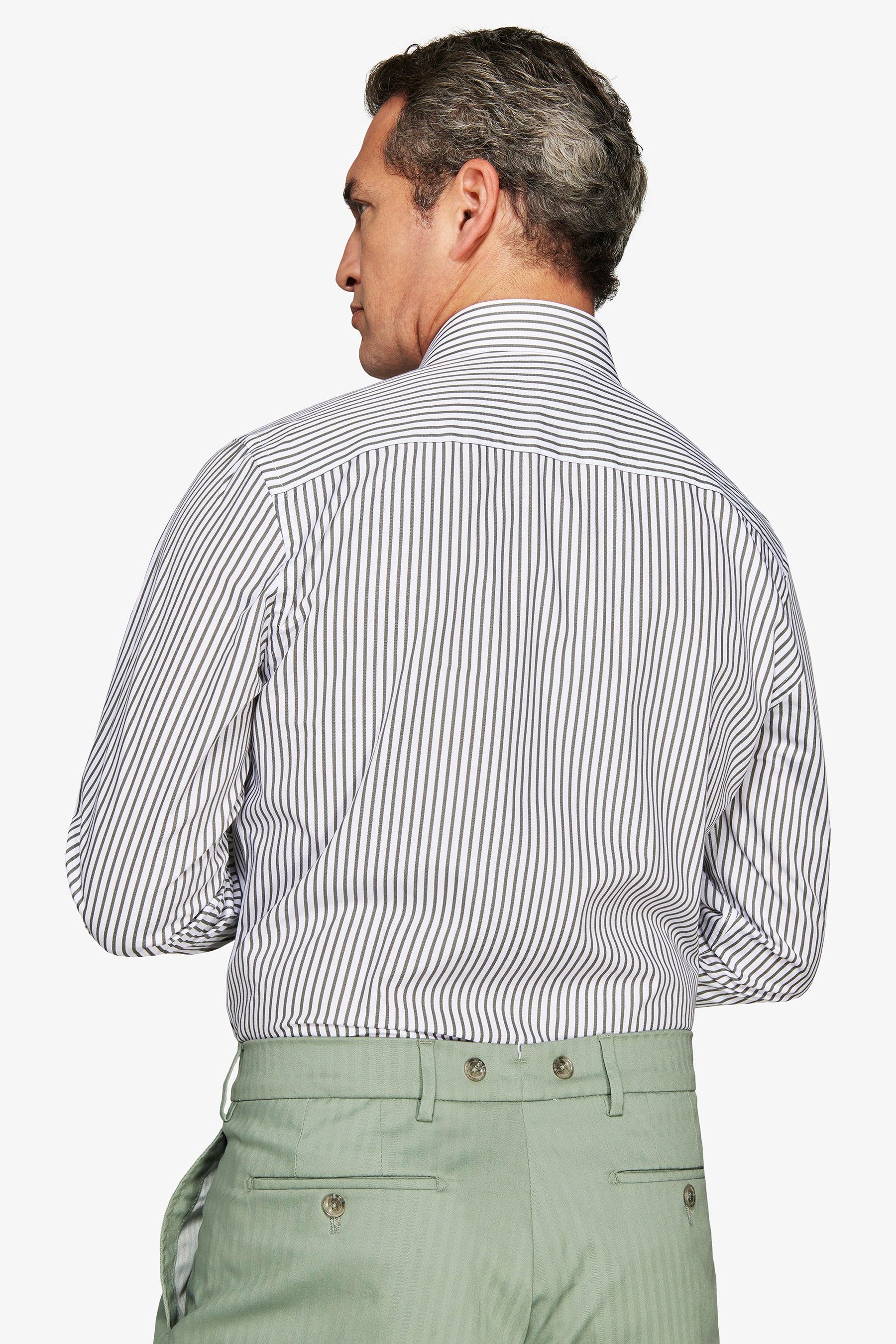 White long-sleeved shirt with thin dark vertical stripes, a collar, and a back yoke.