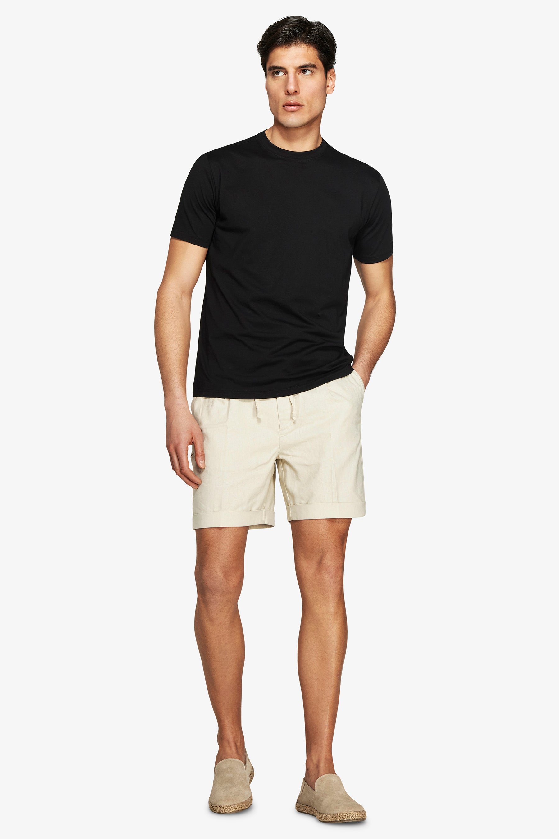 Black men's basic crew neck short sleeve t-shirt made of smooth knit fabric.