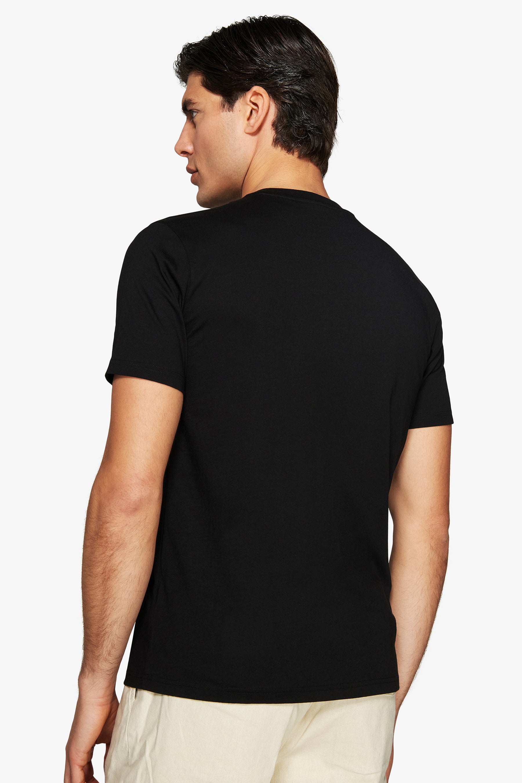 Black men's short sleeve t-shirt with a plain back, crew neck, and straight bottom hem.
