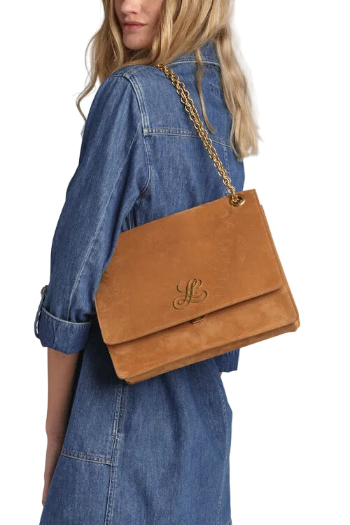 Caramel suede-like flap bag with a gold-toned chain strap and an embroidered 'L' logo on the front.