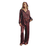 Brown long-sleeved pyjama shirt with lace and pintuck details, paired with matching wide-leg trousers.