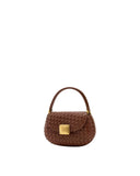 Brown hand-woven bag with a rounded top handle, a curved body, a front flap closure, and a square gold-toned clasp.