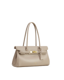 Light taupe shoulder bag with two slender top handles, a front flap, gold-toned turn-lock clasp, two horizontal straps, and a