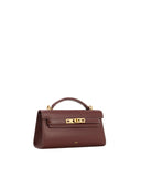 Deep burgundy structured top handle bag with a front flap, gold-toned turn-lock, and white contrast stitching.