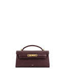 Deep burgundy grained leather top handle bag with a gold-toned turn-lock closure and a single top handle.