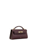 Deep burgundy textured faux leather top handle bag with a structured shape, front flap, and gold-toned turn-lock clasp.