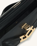 Black faux leather structured top-handle handbag with an open interior showing a gold-toned JW PEI logo and a unique gold-ton