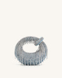 Crescent-shaped blue denim mini top handle bag, covered in silver-toned artificial crystal fringe.