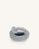 Blue denim mini top handle bag covered in artificial crystals, with a crystal-embellished handle and dangling crystal fringe.