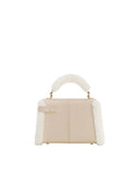 Taupe faux suede top handle bag with white shearling trim on the handle, sides, and bottom. Gold-toned hardware.
