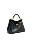 Black crocodile-embossed top handle bag with a single curved handle and gold-toned hardware, featuring a front flap and turn-