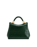 Dark green crocodile-embossed top handle bag with a structured body, curved top edge, and gold-toned handle hardware.