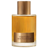 Tom Ford Signature Bois Pacifique EDP Spray in a clear and amber-toned ribbed glass bottle with a gold-toned metallic cap.