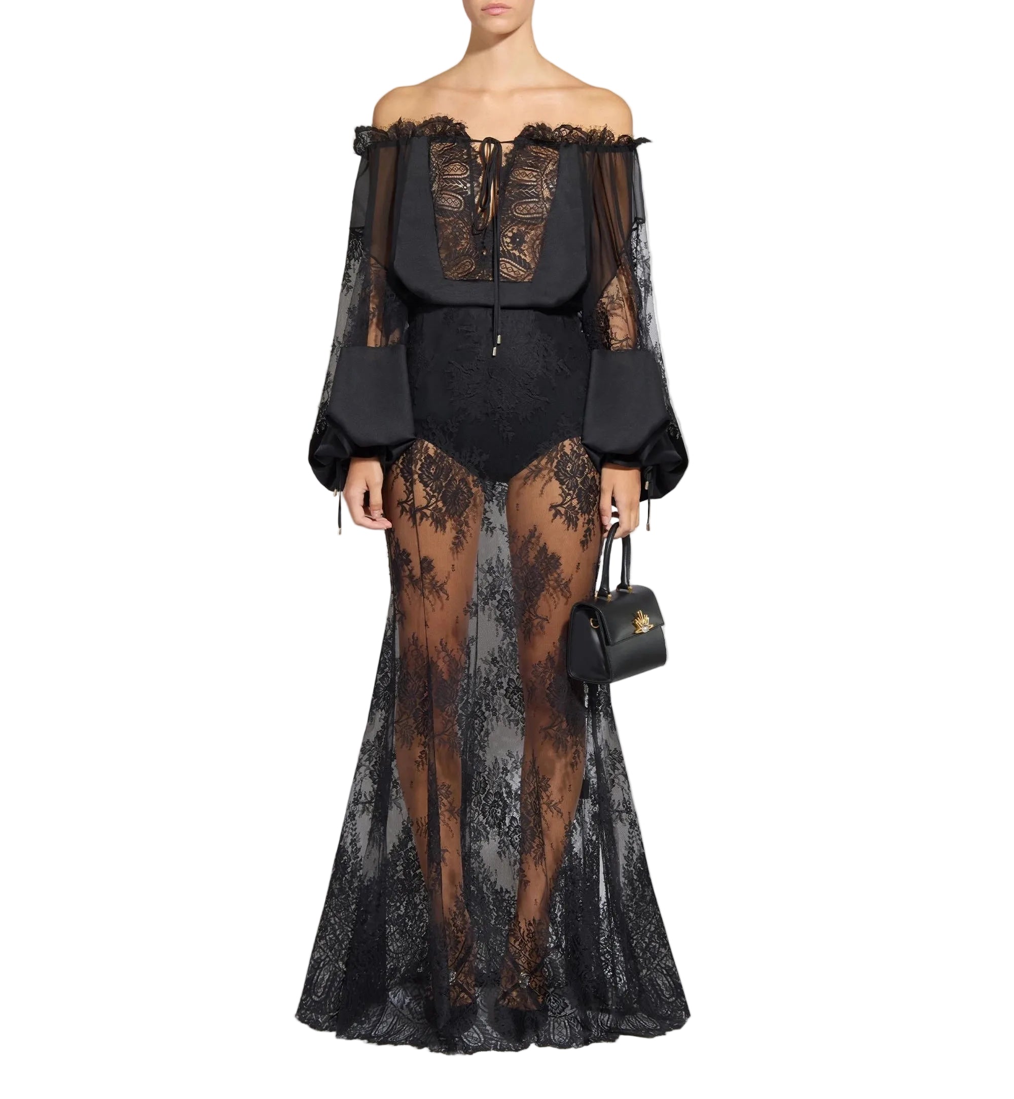 Black off-the-shoulder lace blouse with voluminous sleeves and a matching black sheer lace maxi skirt with opaque lining.