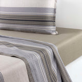 Light beige duvet cover set with textured horizontal stripes in navy, light grey, and olive green.