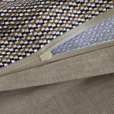 Duvet cover with a white, black, and olive green checkered pattern on one side, and a solid light beige textured reverse. Lig