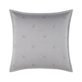 Square pillowcase with thin dark gray vertical stripes on a light gray background, featuring scattered light brown interlocki