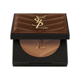 Open black compact powder case with a brown quilted lid featuring a gold-toned YSL logo. The light brown bronzer powder insid