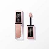 Lancome Idole Tint in a clear and rose-gold-toned rectangular container with a shimmery light peach product on the flocked ap