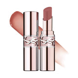 Two rose gold-toned YSL Loveshine Balm tubes, one closed, one open revealing a rosy nude balm, with a clear band featuring a