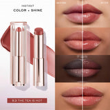 Lancome Lip Idole lipstick in a warm brown-pink shade, with a clear ribbed cap and rose gold-toned base.