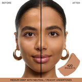 Swatch of Lancome Tiu Stick Foundation in shade 420 Bisque N, a medium-deep tone with neutral/peachy undertones.
