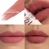 Undressed pink lip balm in a light pink tube with a silver-toned YSL logo band.