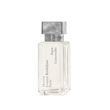 Clear rectangular fragrance bottle with ridged sides, light liquid, and a textured silver-toned square cap. 'Aqua Universalis