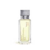 Clear glass rectangular perfume bottle with light yellow liquid and a matte grey cap. 'Maison Francis Kurkdjian Amyris homme'