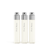 Three clear glass travel perfume refills with light yellow liquid, each featuring a silver-toned spray top and 'Petit Matin'