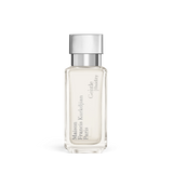 Clear rectangular glass perfume bottle with pale liquid and a silver-toned cap, featuring 'Maison Francis Kurkdjian Paris' an
