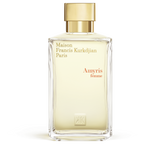 Clear rectangular glass perfume bottle with light yellow liquid and a gold-toned cap. Features 'Maison Francis Kurkdjian' tex