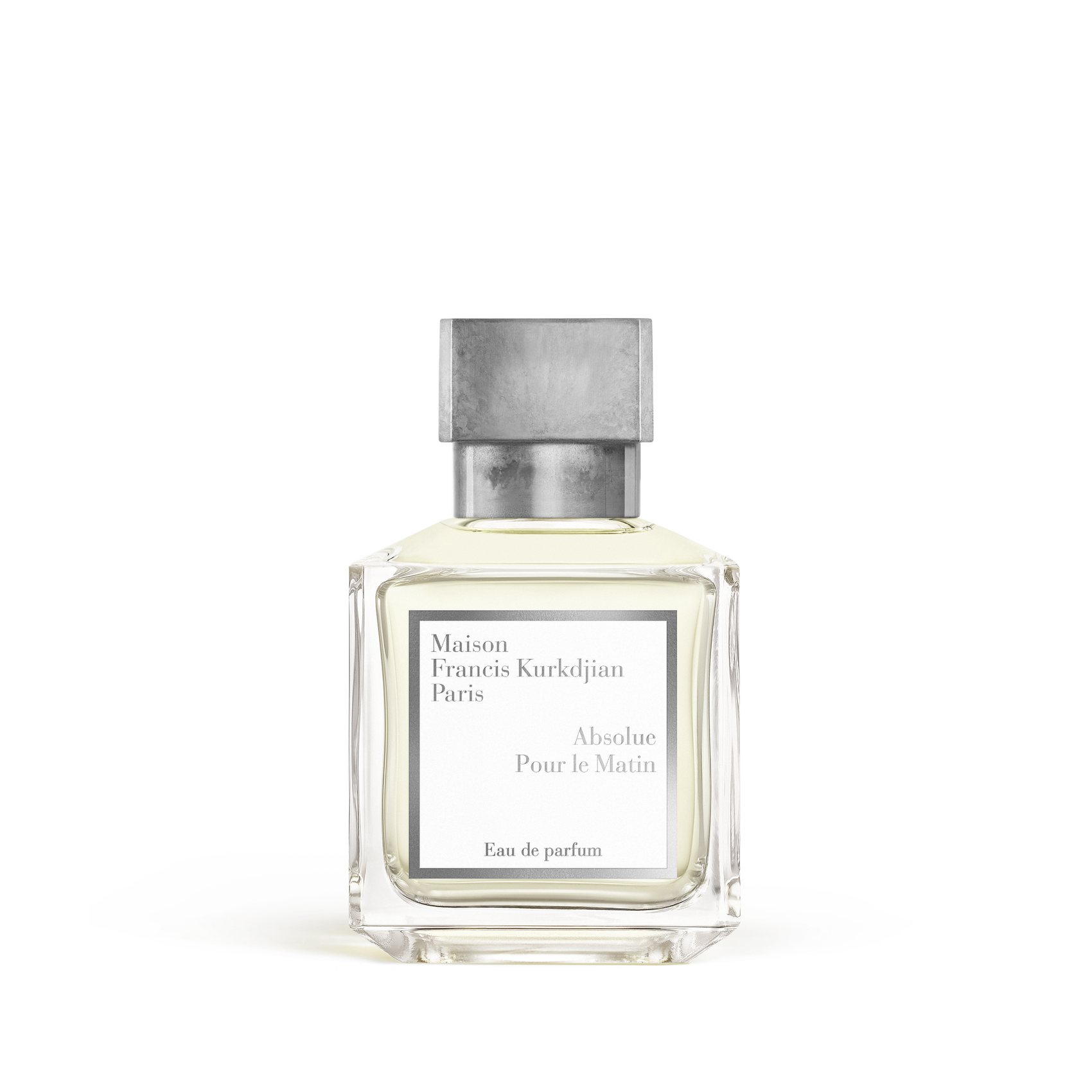 Clear glass rectangular perfume bottle with light yellow liquid and a grey metallic cap, featuring a white label.