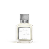 Clear glass rectangular perfume bottle with light yellow liquid and a grey metallic cap, featuring a white label.